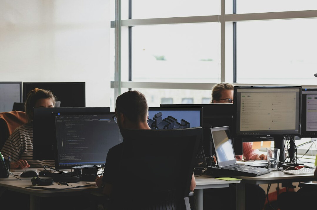 team of programmers in office